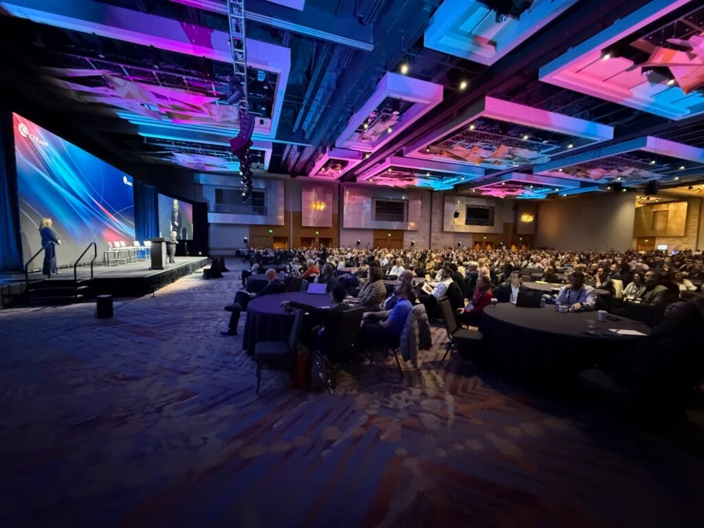 Stage presentation and full audience at the DCPA Conference in Las Vegas with AV production and lighting by Mongoose AV
