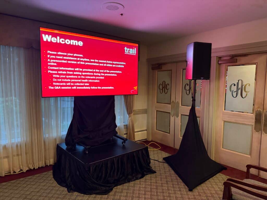 Audio and video control booth during live event production at Aurora Country Club in Aurora Illinois