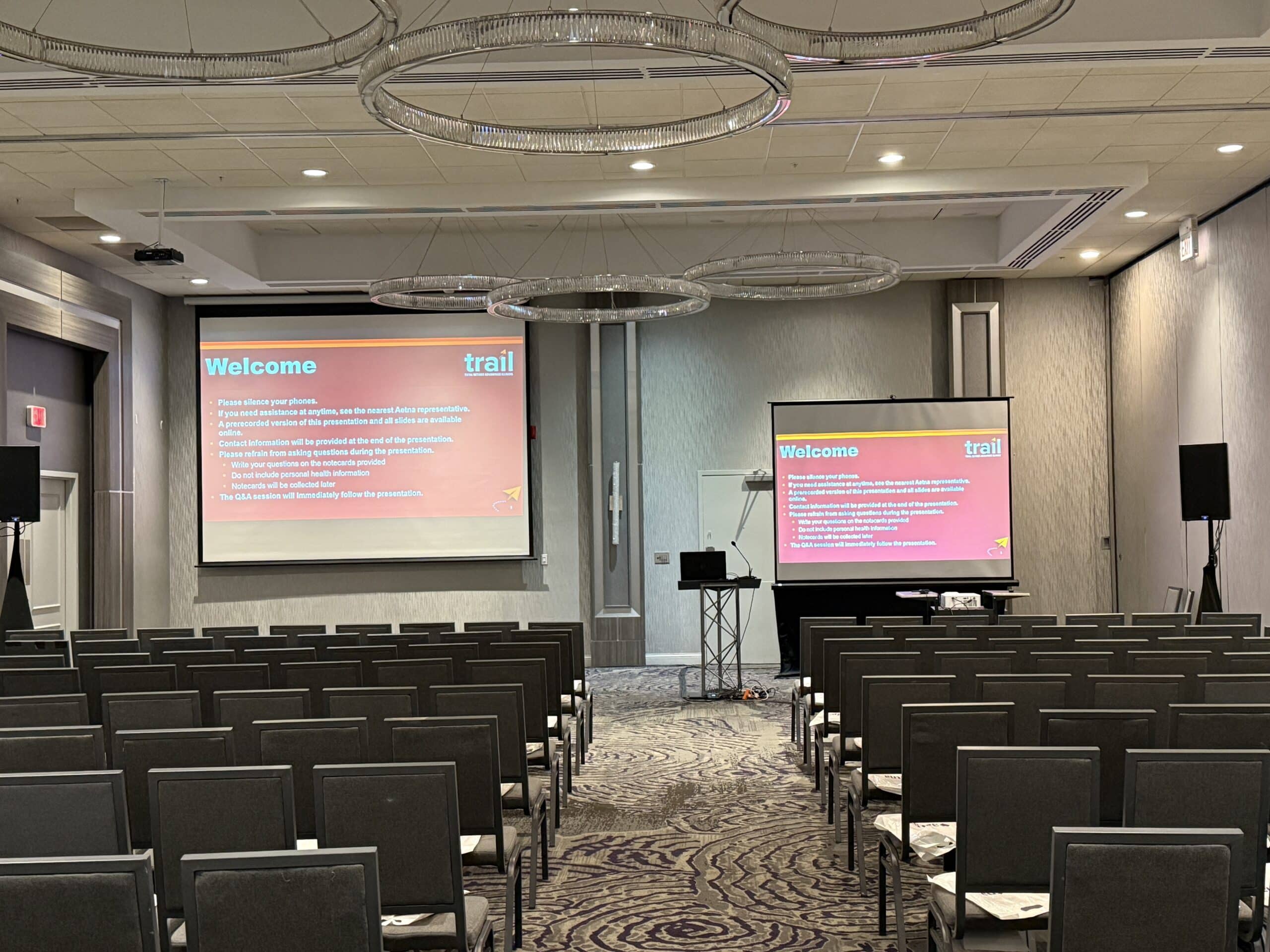 Audio and video control booth setup during live event production at Holiday Inn Crystal Lake IL