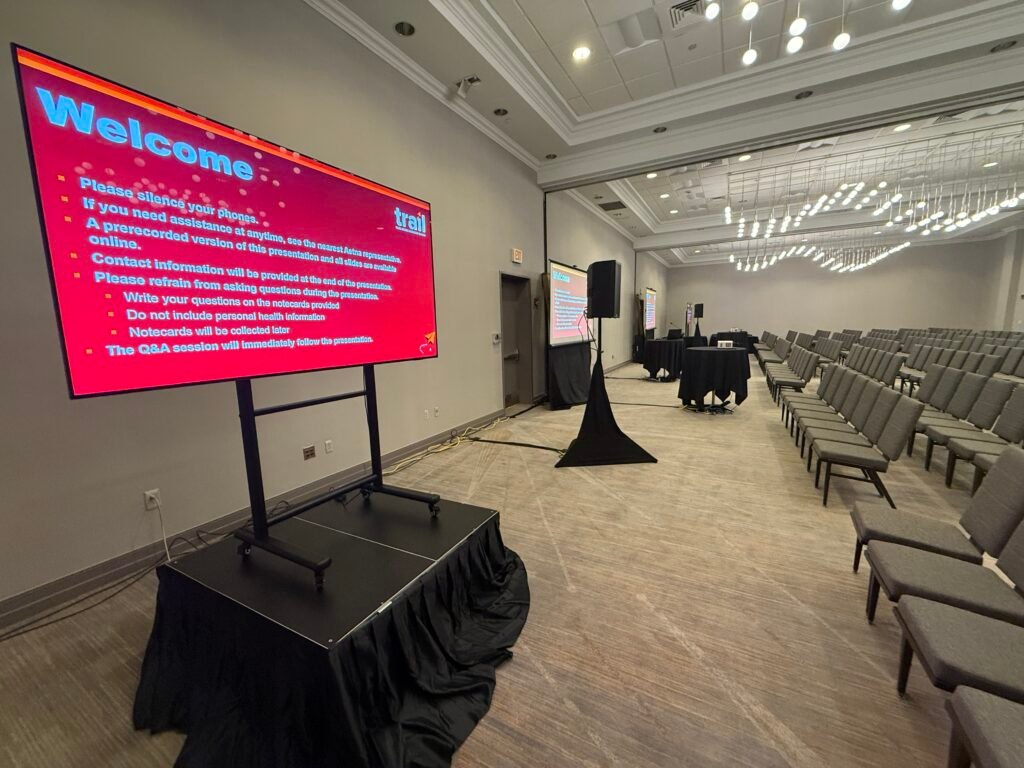 Stage and projector setup for live presentation at Chicago Marriott Midway